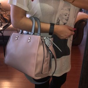 Dirty pink and grey colour purse. Silver hardware.
